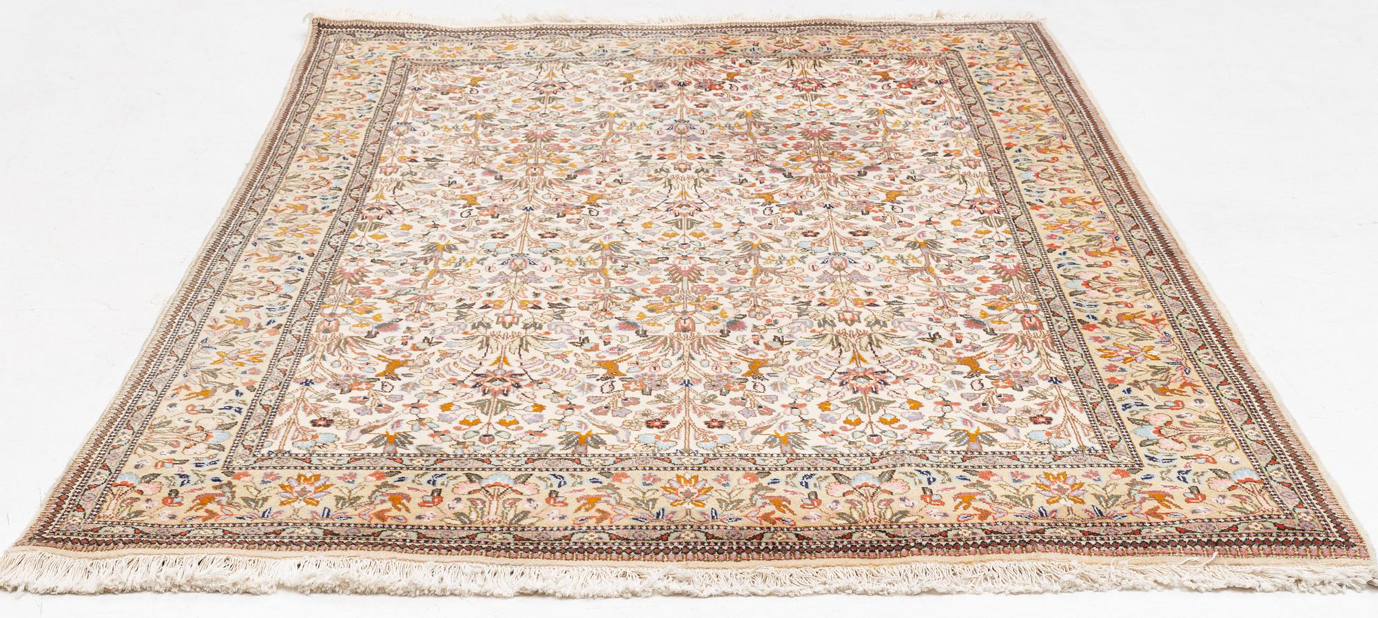 A Tabriz carpet, so called Tabatabai, c. 285 x 200 cm.