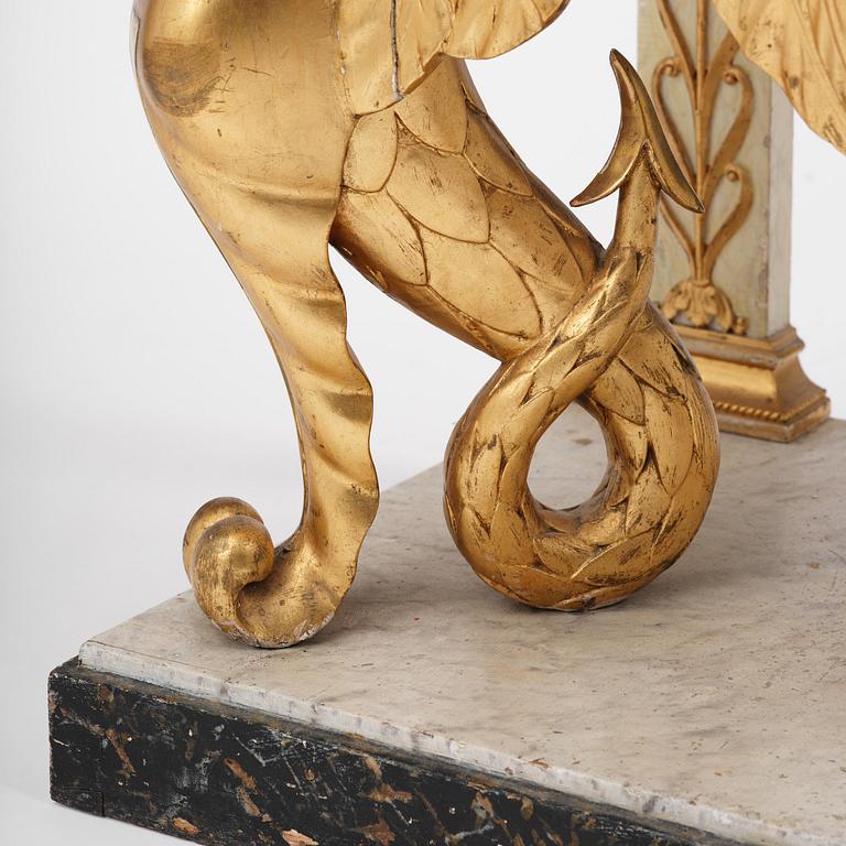 A Swedish Empire gilt wood and white marbel console table.