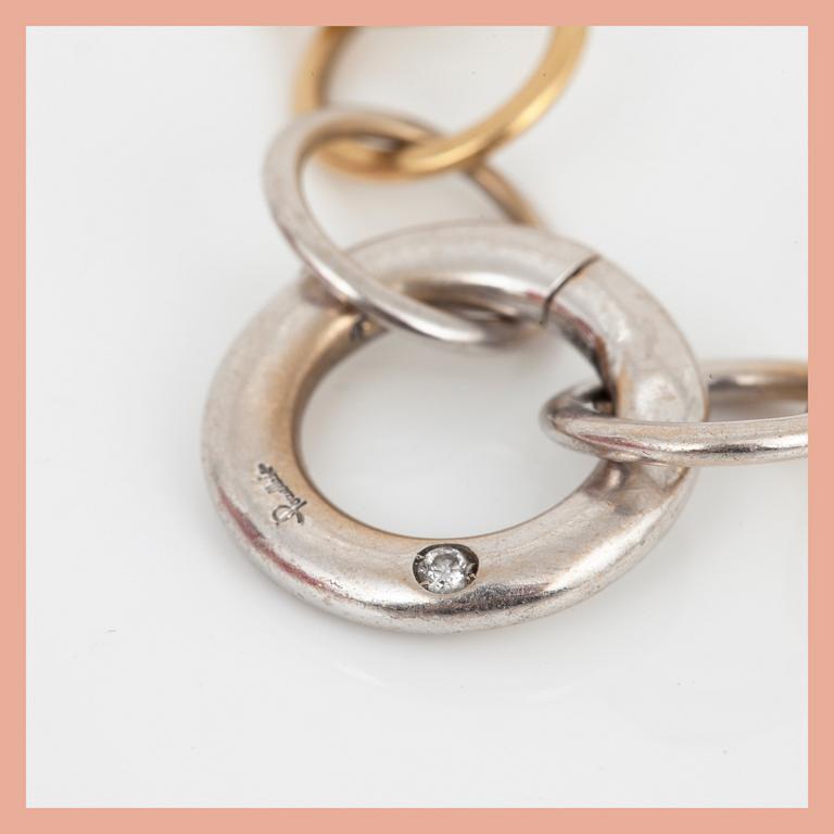 ARMBAND, 18K flerfärgat guld, Pomellato "Lucciole", samt briljantslipad diamant tot ca 0,03 ct. Total vikt ca 20,80 g.