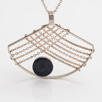 Elis Kauppi, A sterling silver neckalce with a spectrolite. Kupittaan kulta, Turku.