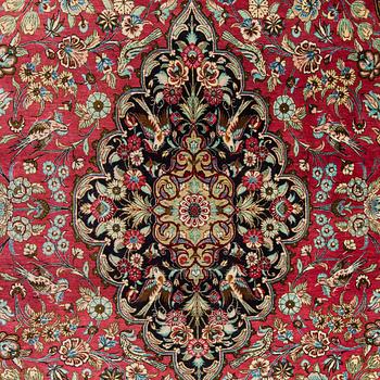 A silk Qum rug, central Persia, approx. 232 x 137 cm.