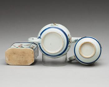 A famille verte and underglaze blue teapot, milk jug and tea caddy. 18th Century.