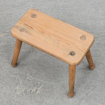 A pine stool, second half of the 20th century.