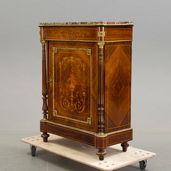 An early 20th century Louis XVI style cabinet.