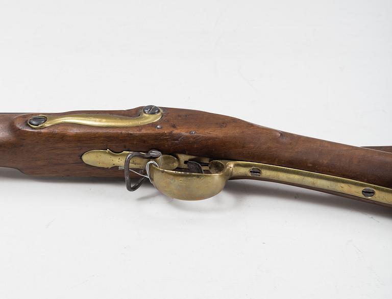 A 18th Century Swedish-British converted percussion gun.