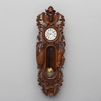 A Lenzkirch walnut wall clock from Germany, 1910s / 20s.