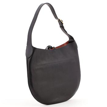 Céline, CÉLINE, a black leather shoulder bag.