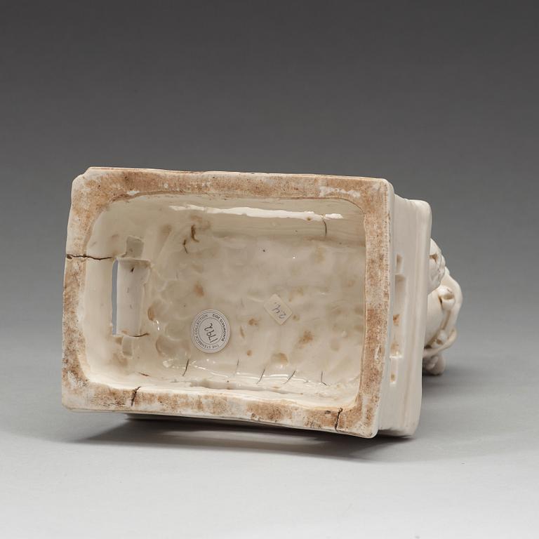 A blanc de chine joss stick holder, Transition, 17th Century.