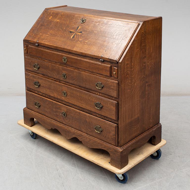 A mid 18th century oak secretaire.