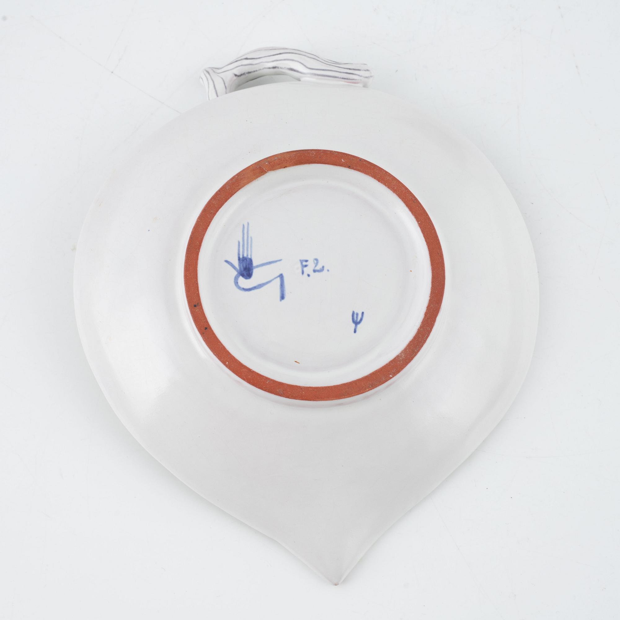 Stig Lindberg, five earthenware dishes and a bowl, Gustavsberg Studio, Sweden.