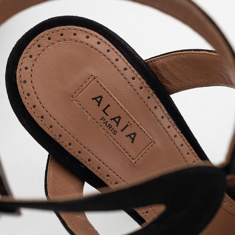 Alaïa, a pair of black suede sandals, size 37.