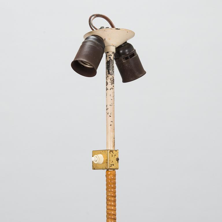 Paavo Tynell, a mid-20th century floor lamp model 9602 for Taito Finland.
