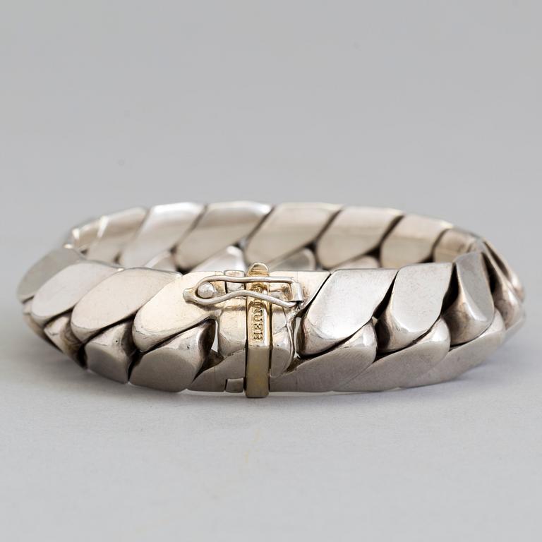 HERMÈS bracelet in silver and 18K gold.