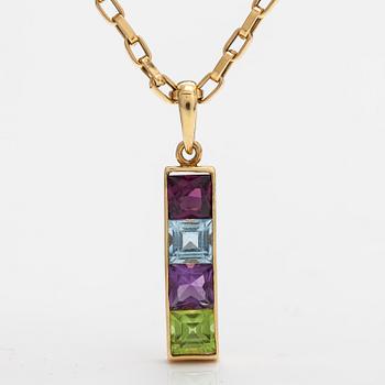 An 18K gold necklace with a garnet, peridote, amethyst and topaz.