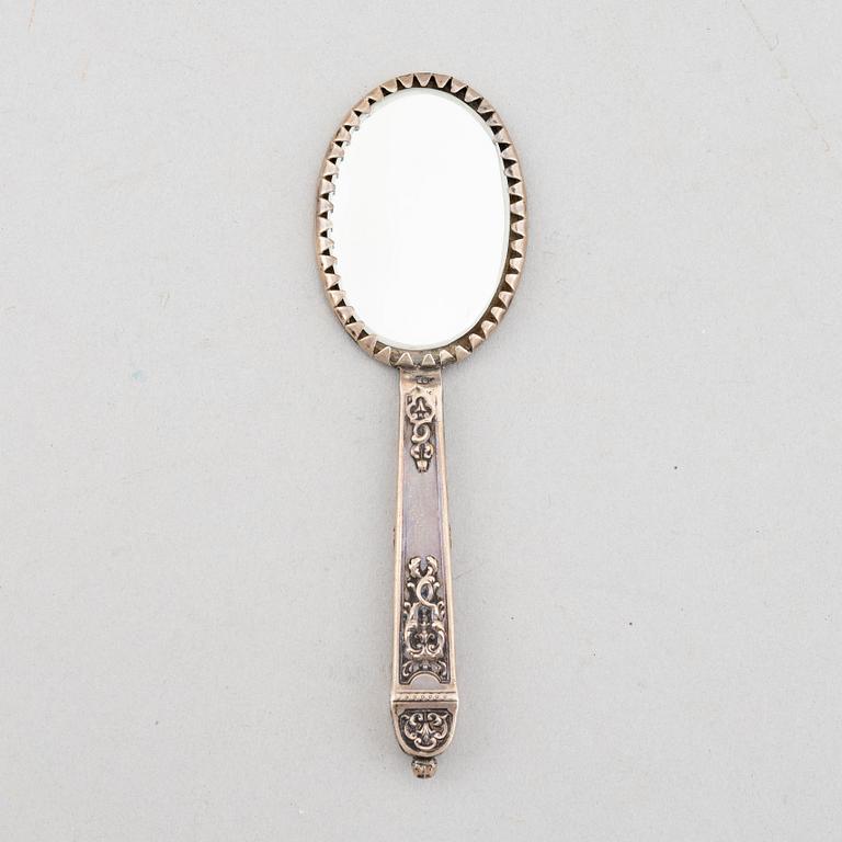Goblet on foot, hand mirror, and box, silver.