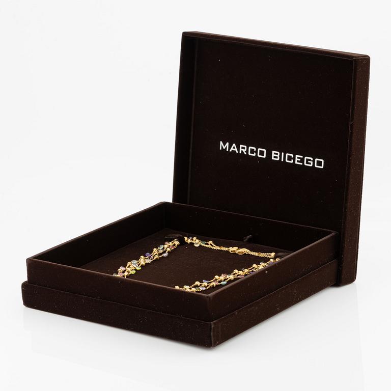 Marco Bicego a three strand necklace in 18K gold with coloured stones.