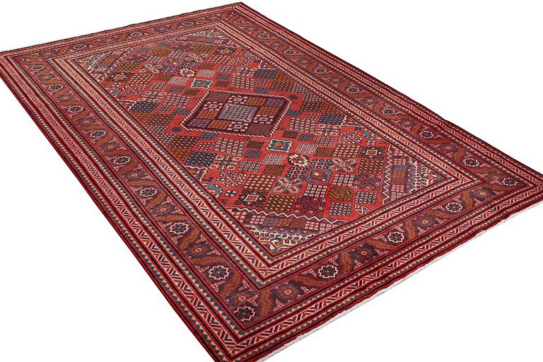 A carpet, Mahabad, c. 308 x 208 cm.