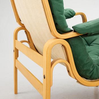 Bruno Mathsson, a pair of "Ingrid" armchairs, Dux, Sweden, second half of the 20th century.