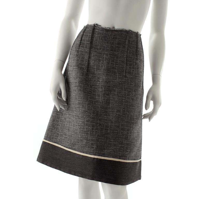 MARNI, a grey wool blend skirt with silver treads.