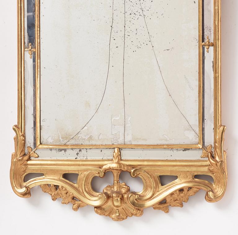 A Rococo giltwood mirror by N. Meunier (master in Stockholm 1754-97).