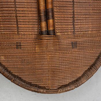 An early 20th Century rattan shield, Mongo-Ngandu, DRC.