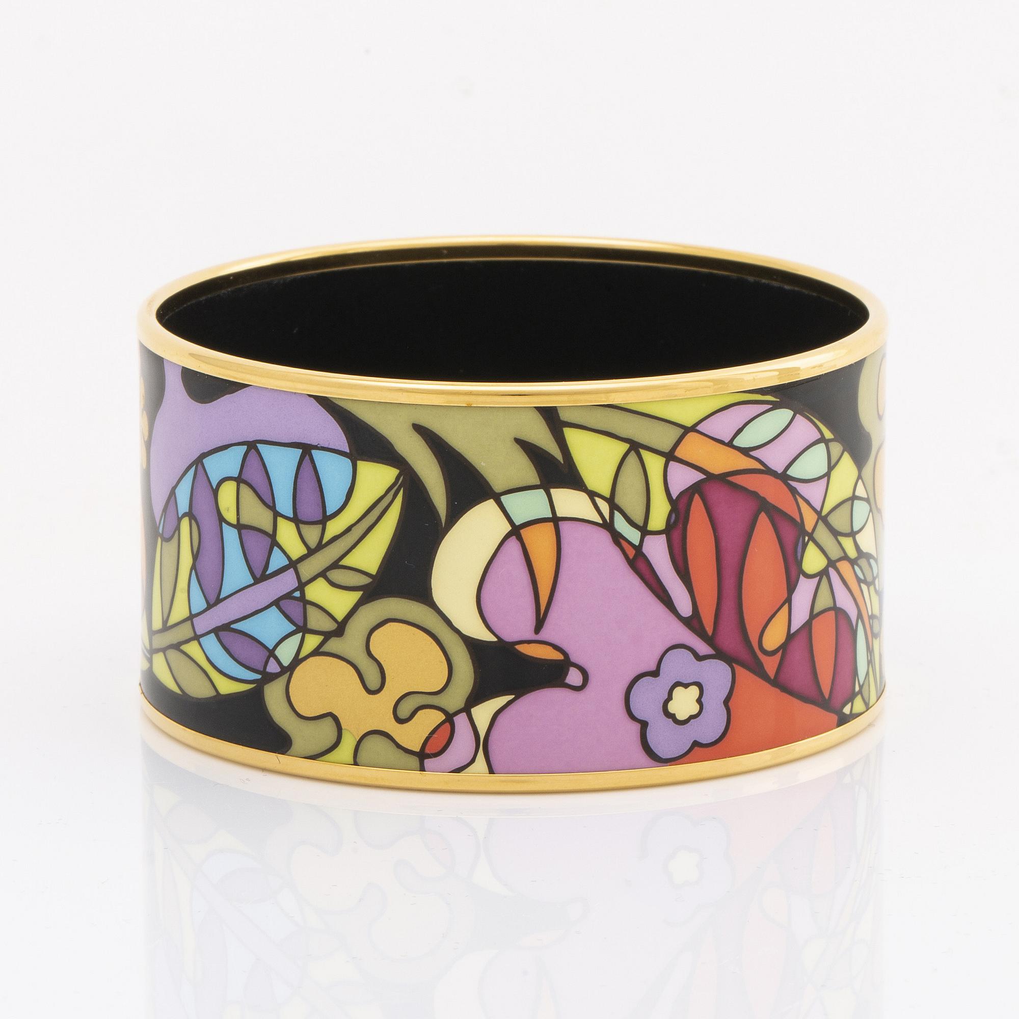 Frey Wille, an 'Ode to Joy of Life Paradise Moonlight' enamel and gilt metal bangle, Austria, c 2012.
