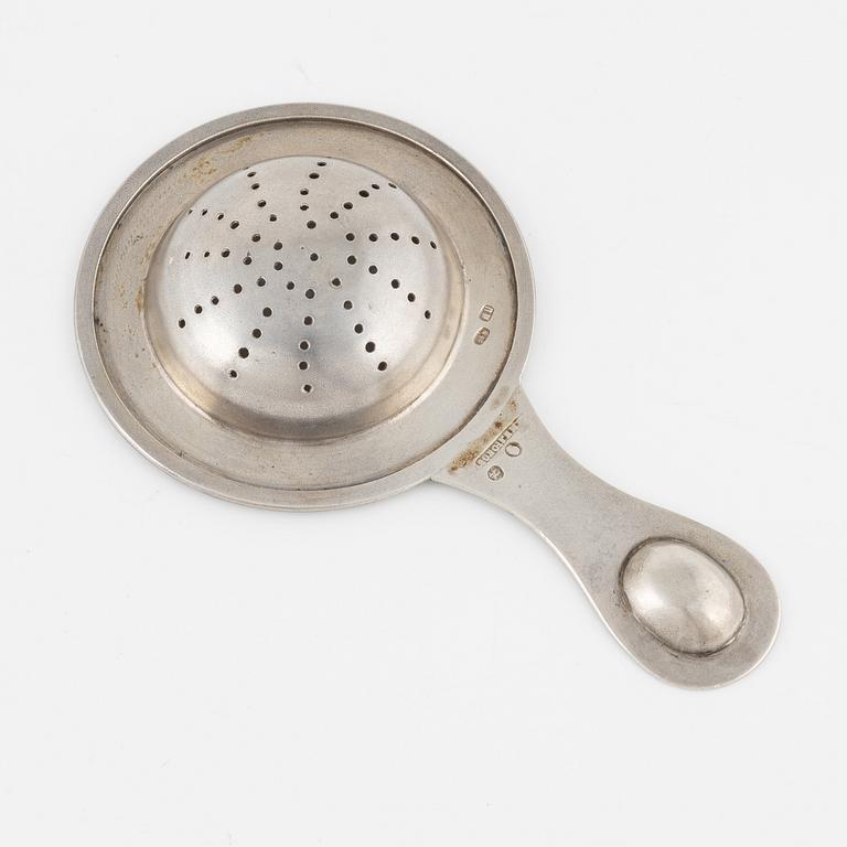 A Russian Parcel-Gilt Silver Tea Strainer, late 19th Century.