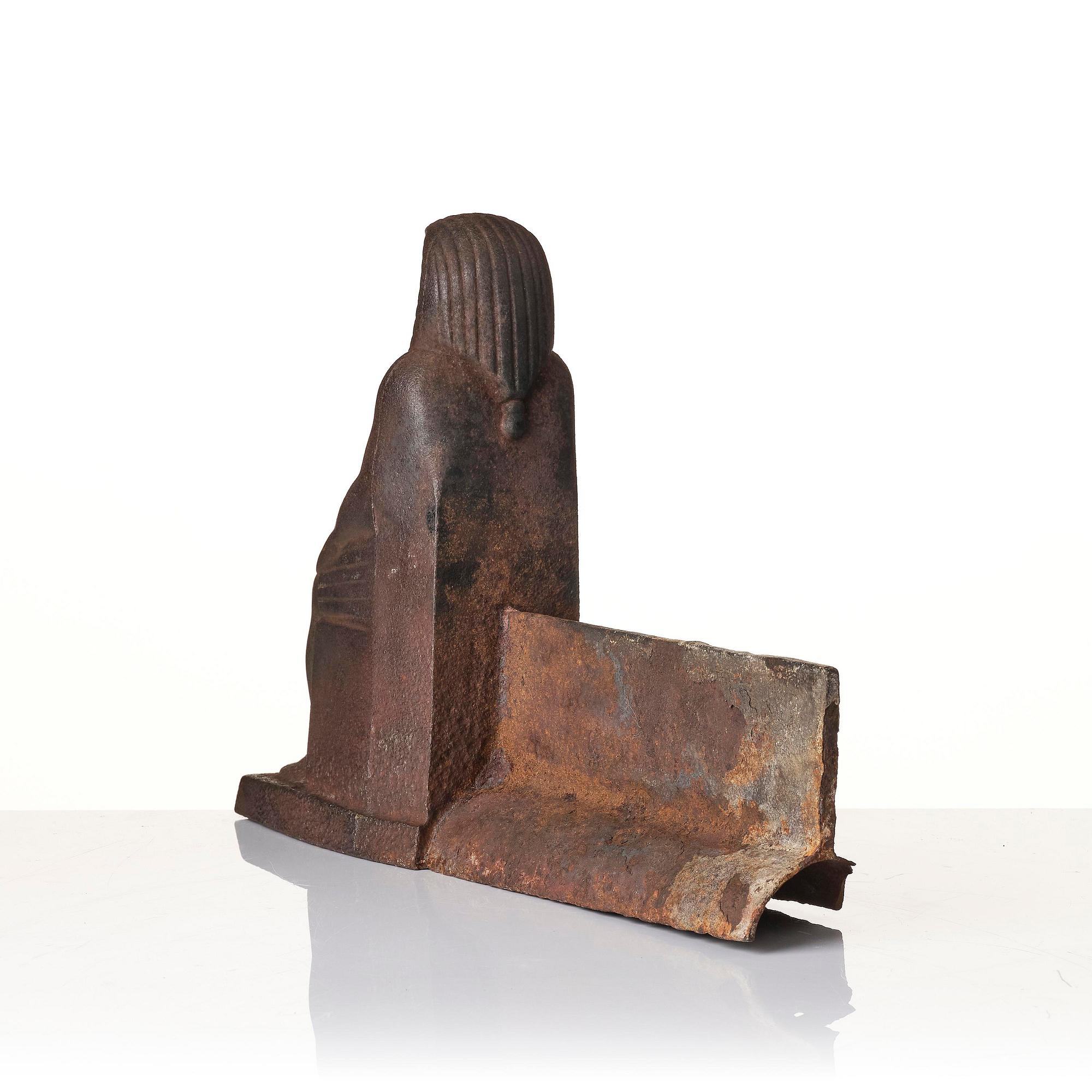 A pair of French Empire cast iron chenets, first part 19th century.