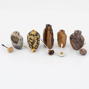 Ten snuff bottles, mottled stone, China, 20th century.