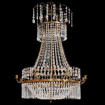 114. A late Gustavian nine-light gilt brass and cut glass chandelier, Stockholm, late 18th century.