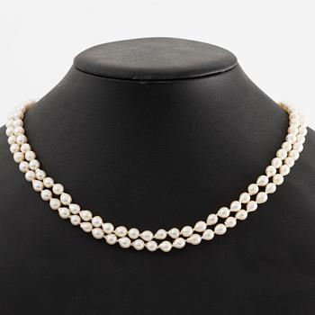 Necklace two rows of cultured pearls clasp 18K gold.