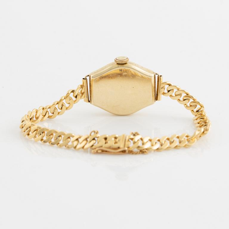 Svalan gold ladiews watch.