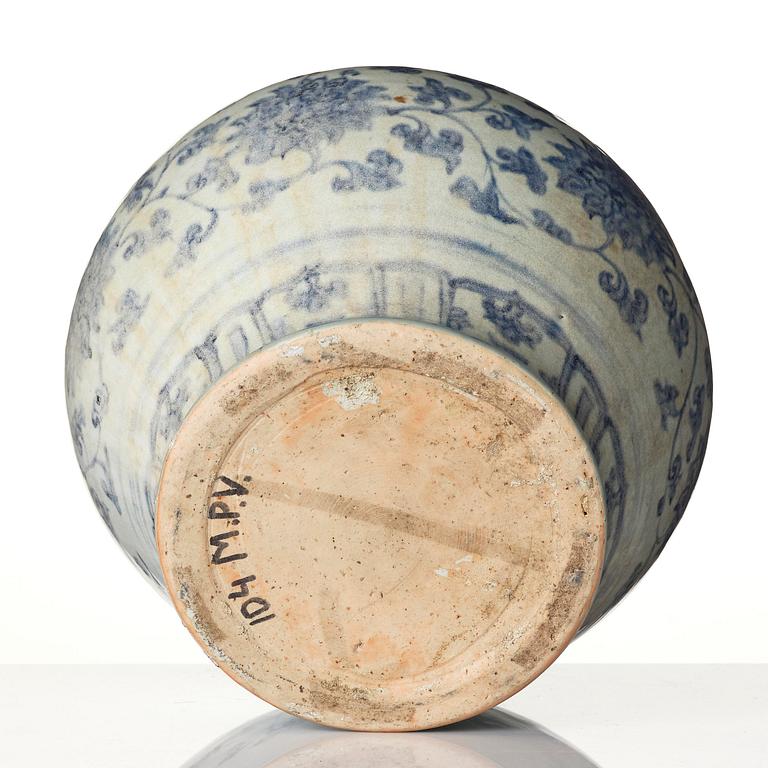 A large blue and white 'lotus' jar, Guan, Ming dynasty, Jiajing, 16th century.