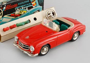 A Schuco toy car.