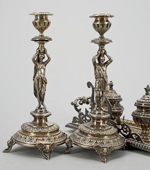 SKRIVSTÄLL samt ett par LJUSSTAKAR, nysilver, stileklekticism, bla GAB, omkring 1900.