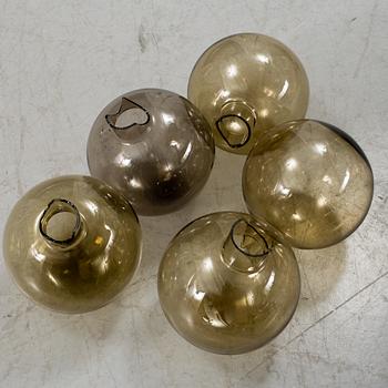 A 20th century brass and smoked glass chandelier by Hans Agne Jakobsson, Markaryd, Sweden.