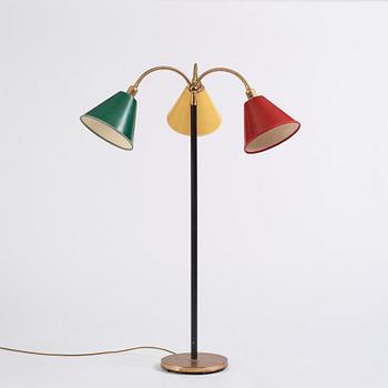 Josef Frank, a brass and black lacquered floor lamp model "2431", Firma Svenskt Tenn, Sweden.