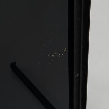 A black glass coffee table, second half of the 20th century.