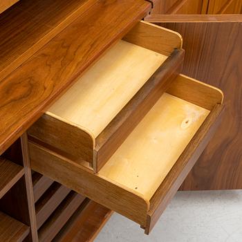 Carl Malmsten, a walnut veneer bookshelf in 4 parts, 1962.