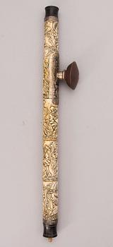 A bone, metal and wood opium pipe, probably China, circa 1900.