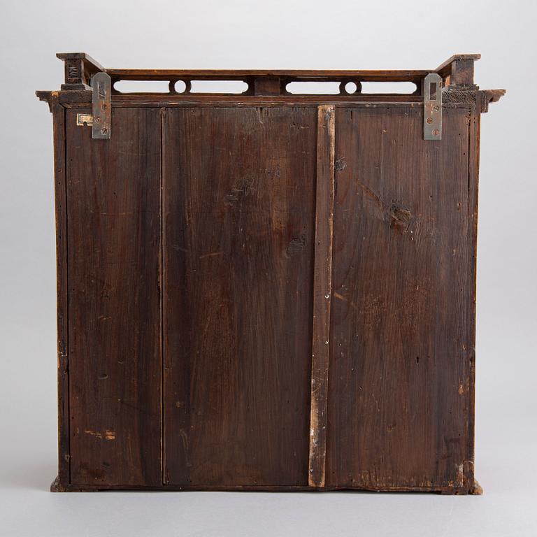 An 18/19th century cabinet, according to information Prague, Czech Republic.