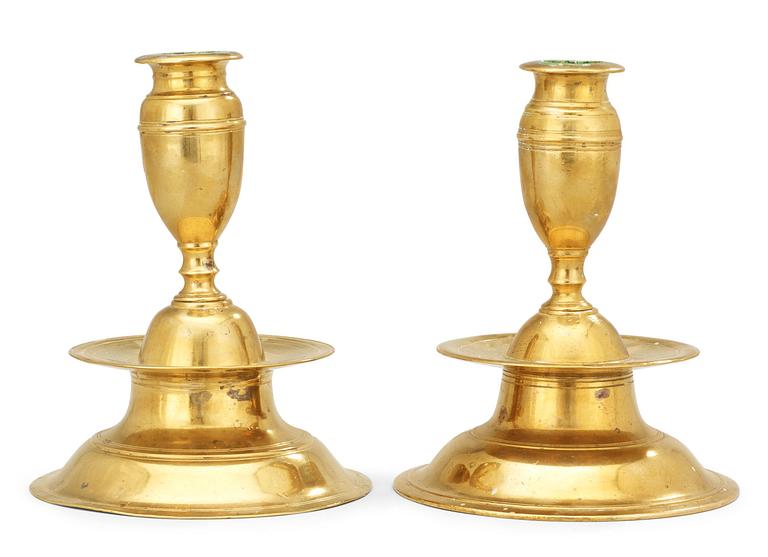 Two matched circa 1700 baroque candlesticks.