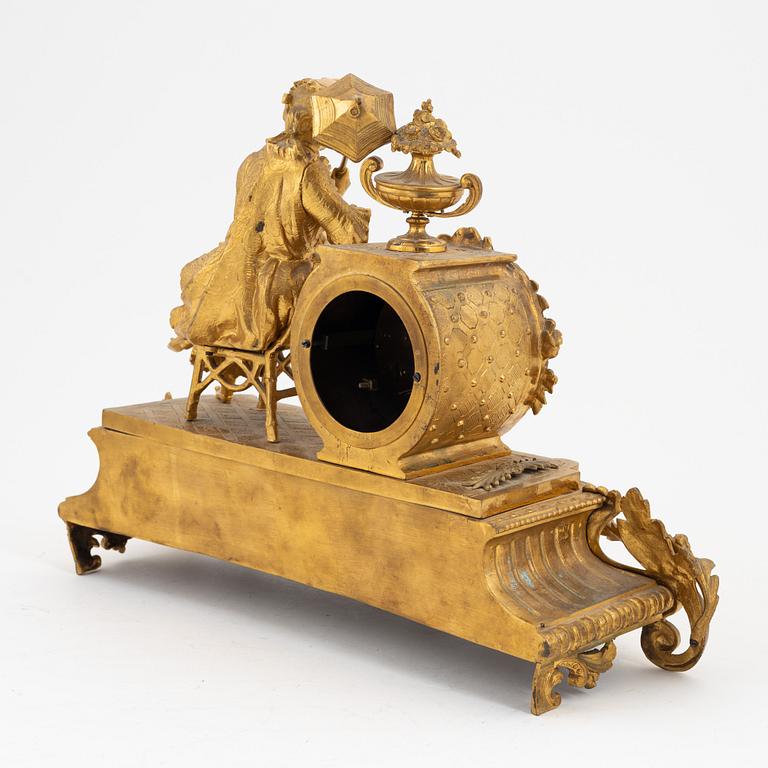 A French Rococo revival table clock, late 19th Century.