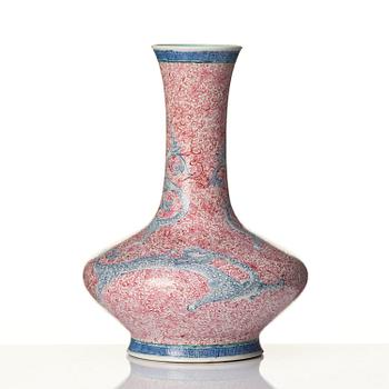 A rare pink and blue enamelled vase with dragons, late Qing dynasty/Republic with an apocryphal Qianlong mark.