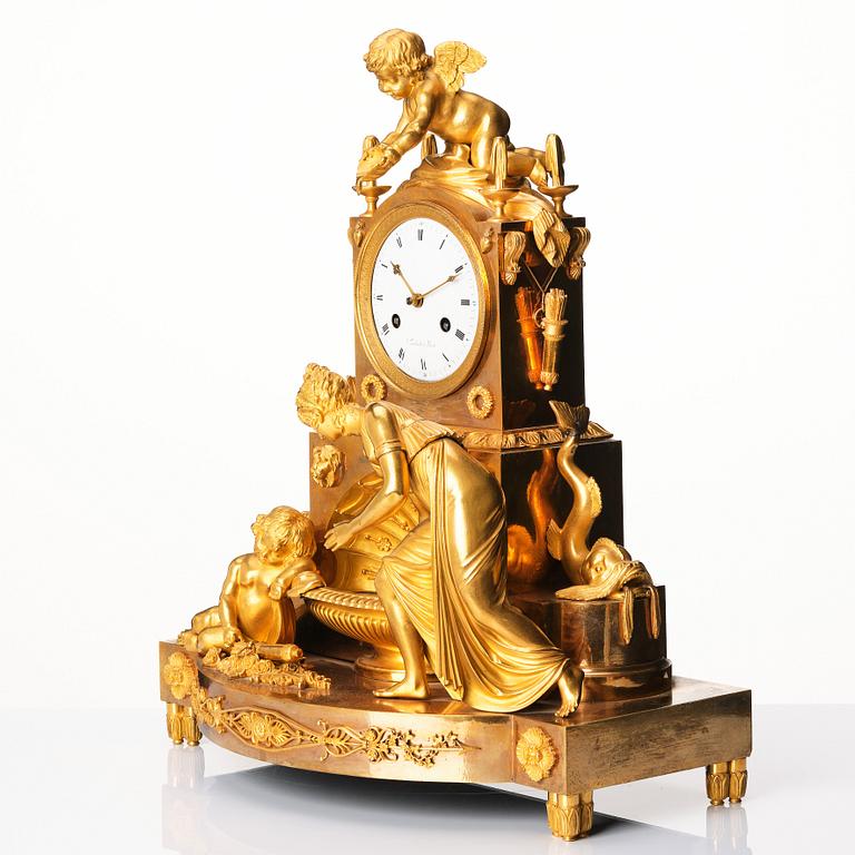 An Empire ormolu mantel clock 'La fontaine de l'Amour', early 19th century.