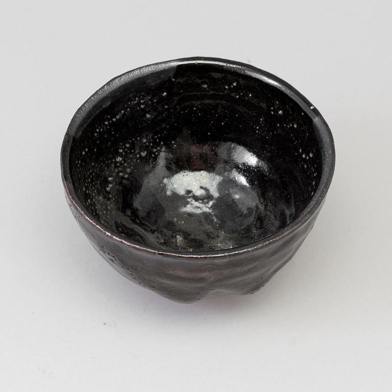 A Japanese Raku stoneware bowl, 20th century.