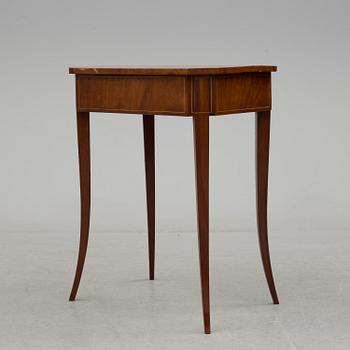 A second half of the 19th century mahogany veneered table.