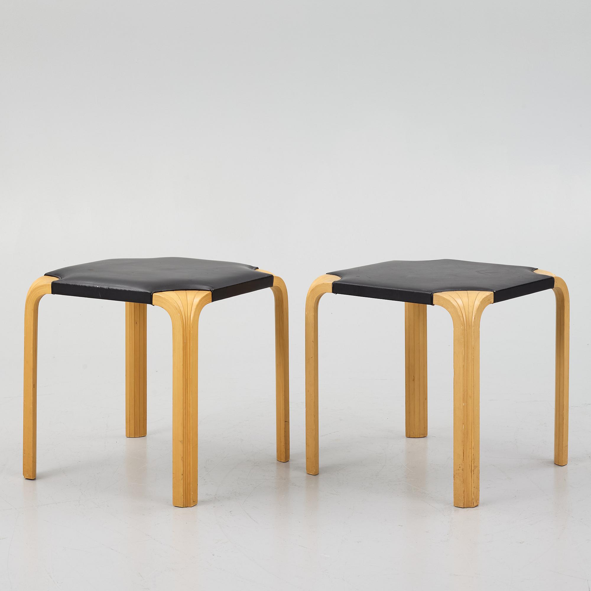 Alvar Aalto, a pair of 'X601' stool for Artek, later half of the 20th century.