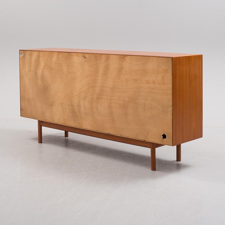 A second half of the 20th century teak veneered sideboard by Central Møbler Bolighus, Denmark.