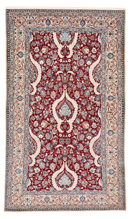 A CARPET, a semi-antique/old Esfahan/Nain part silk, ca 232,5 x 137,5 cm (as well as one end with ca 1 cm flat weave).